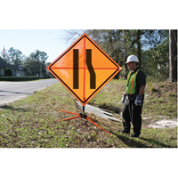 Tilt-Adjust™ Merge Left Roll-Up Construction Sign, 36" x 36", Vinyl, Pictogram SEE386 | NTL Industrial